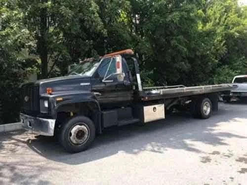 High Tide flatbed tow truck